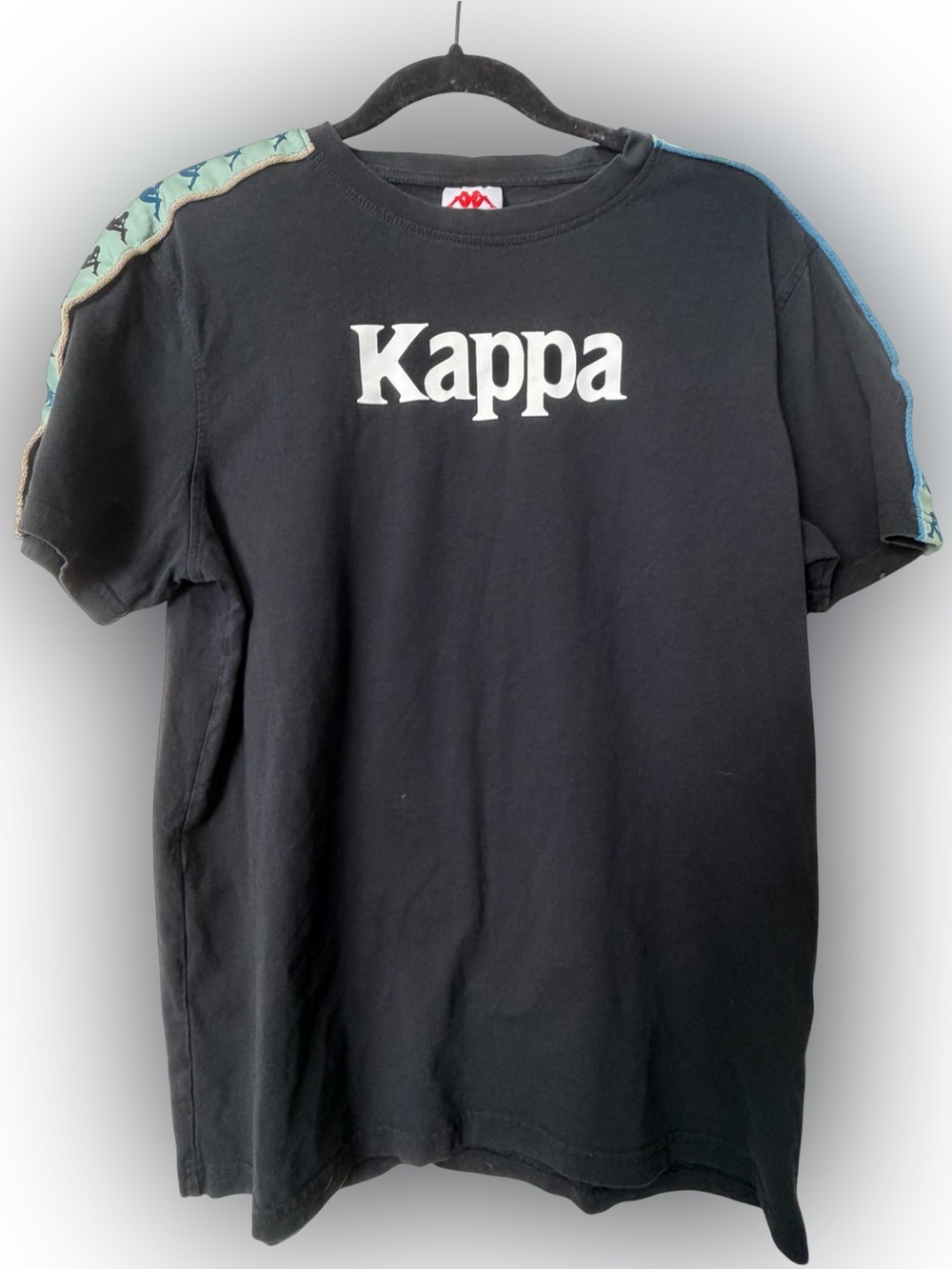 Kappa Black Tee with White Logo and Blue-Green Shoulder Stripes